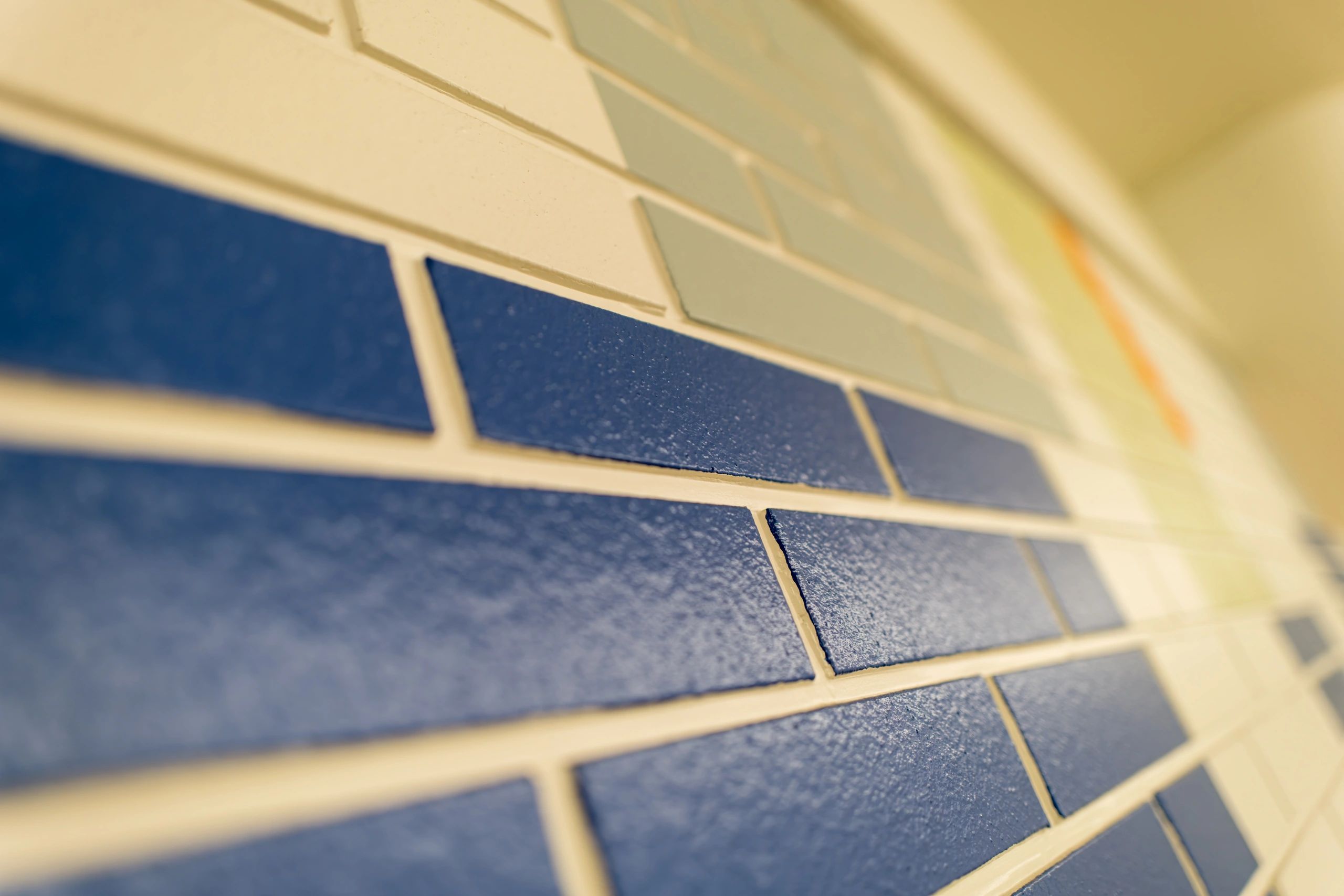 Colorful tile pattern representing restored pool finishes