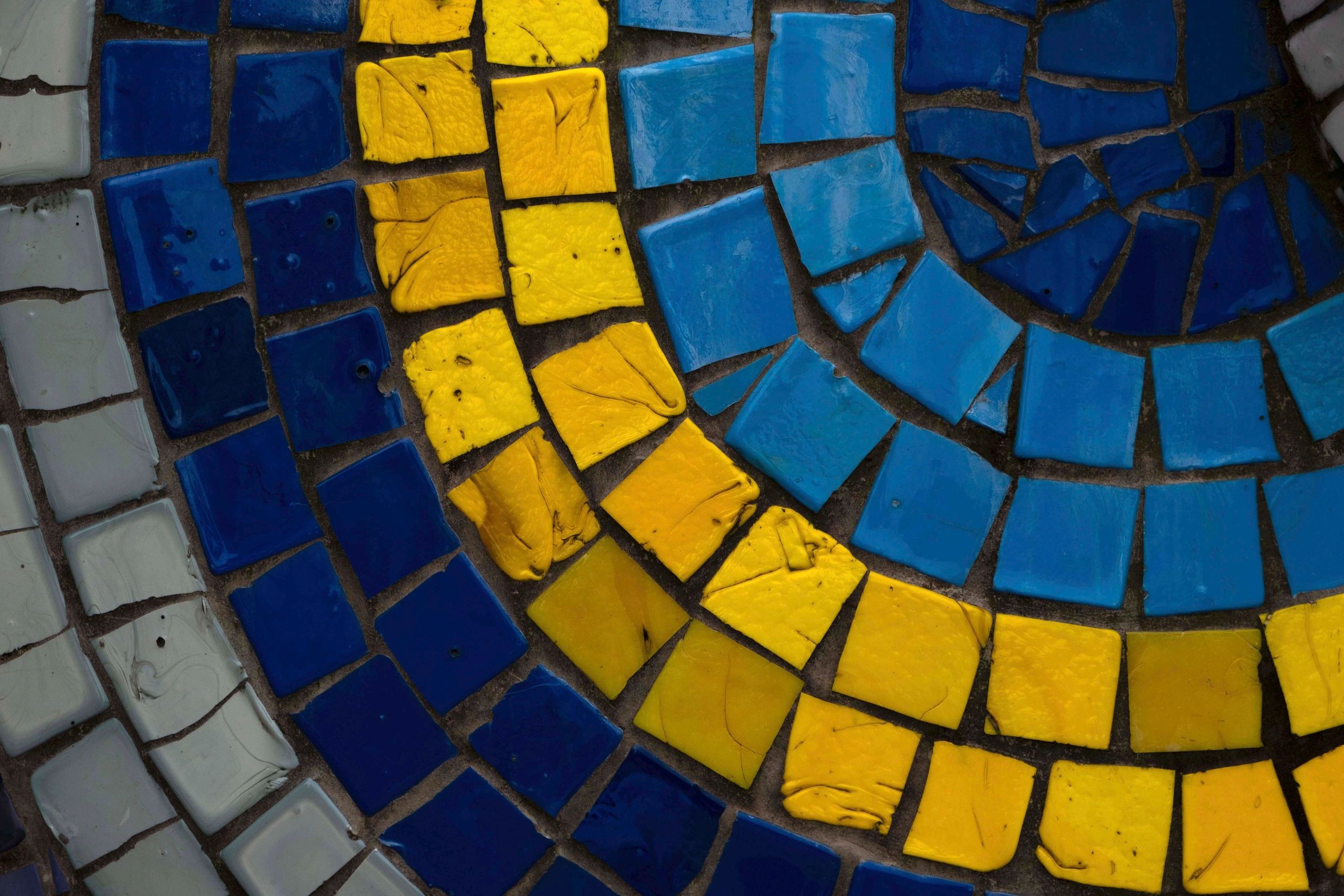 Yellow and blue pool tile detail