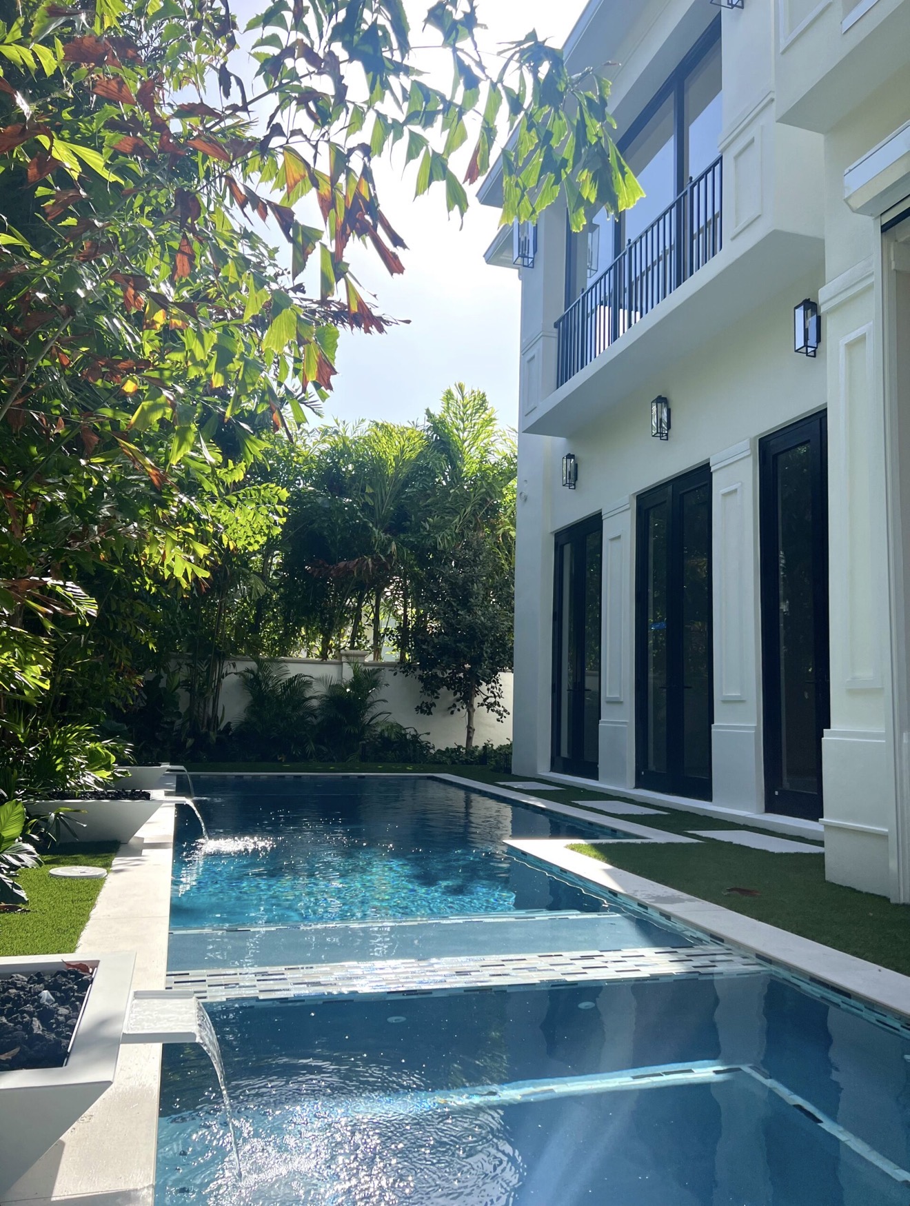 Pool and spa with emphasis on the pool